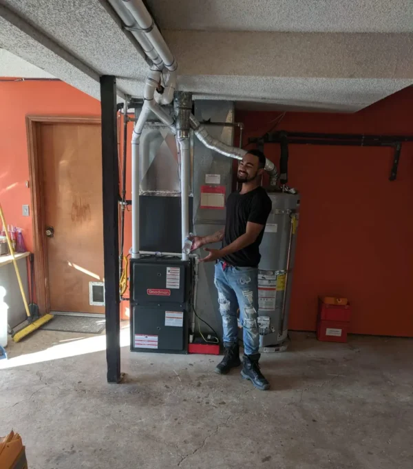 Duct Guys Portland Oregon HVAC company technician servicing residential heating equipment
